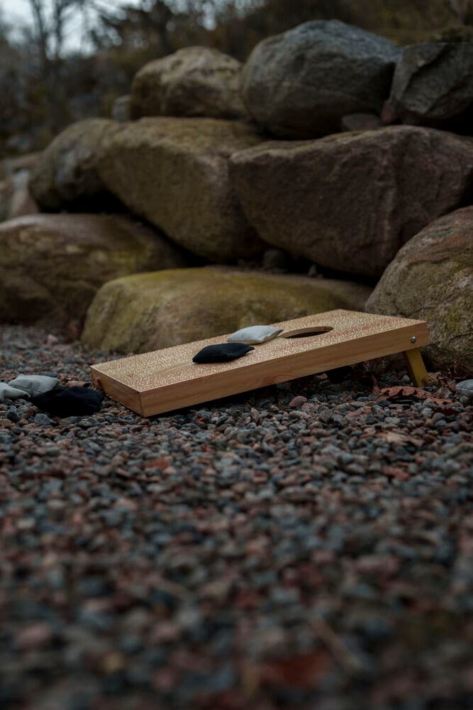 Cornhole Spill, På modell 1